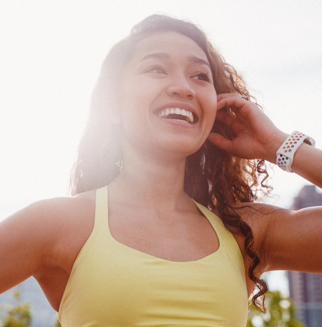 Person exercising with fitness technology for health and wellness